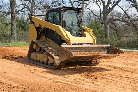 how to level ground with a skid steer without digging|skid steer grading instructions.